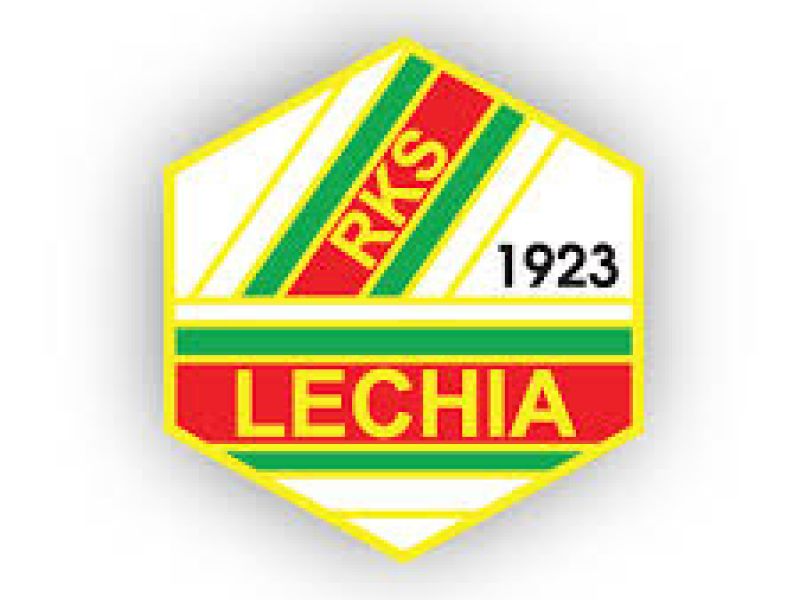 Na zdjęciu sześciokąt w barwach czerwieni, zieleni, żółci i bieli z napisami: Lechia, RKS, 1923 - logo Lechii